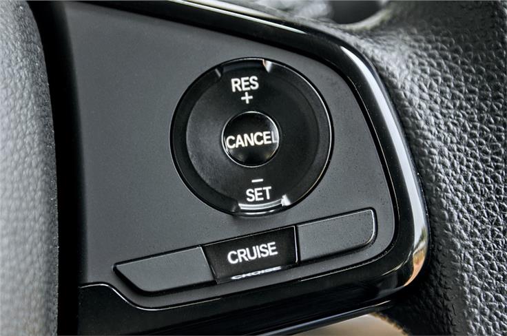 Cruise control and steering-mounted buttons feel great to use.